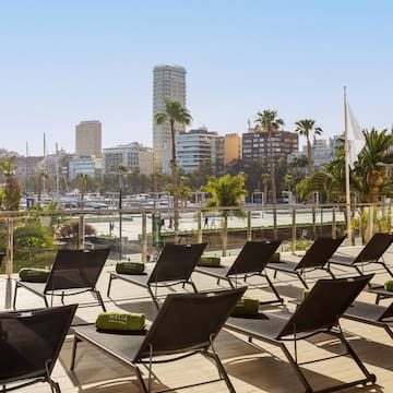 a group of lounge chairs on a deck