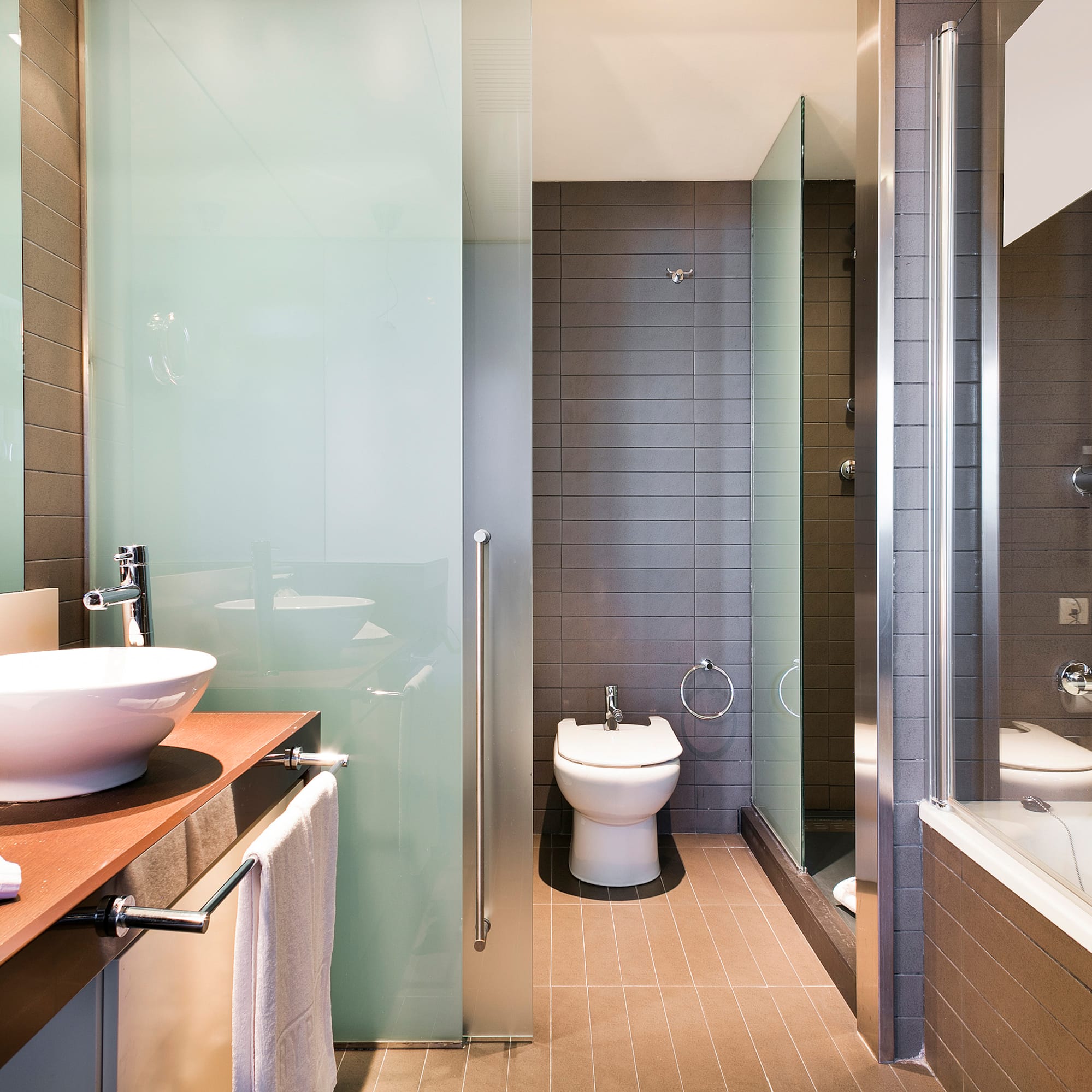 a bathroom with a sink and shower