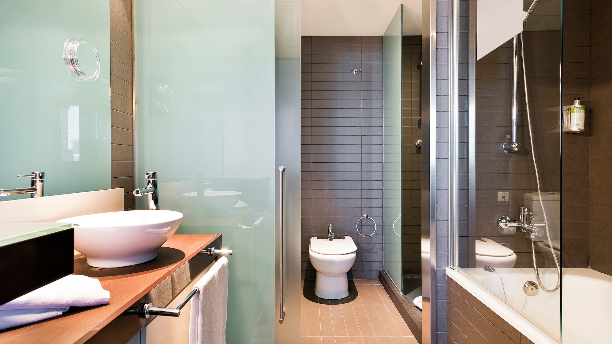 a bathroom with a sink and shower