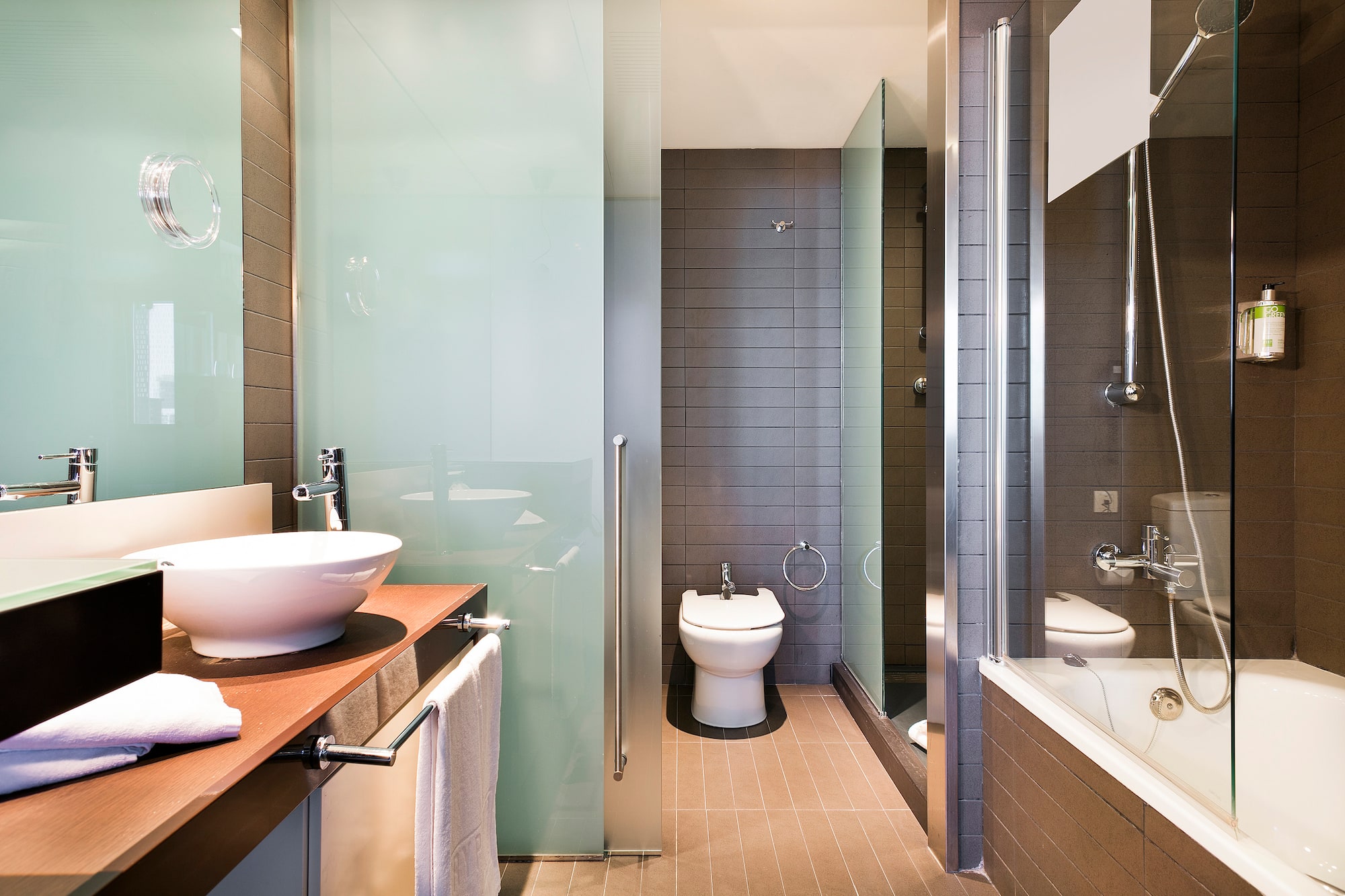 a bathroom with a sink and shower