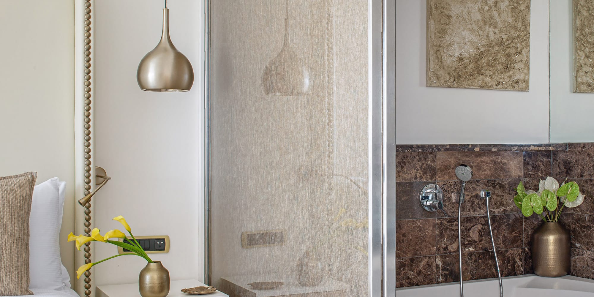 a bathroom with a shower and a bed