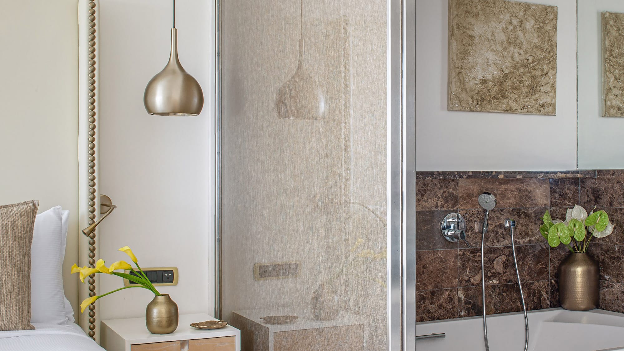 a bathroom with a shower and a bed