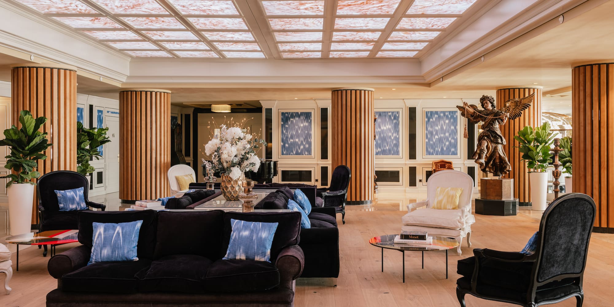 a large room with a large ceiling and a large table and chairs