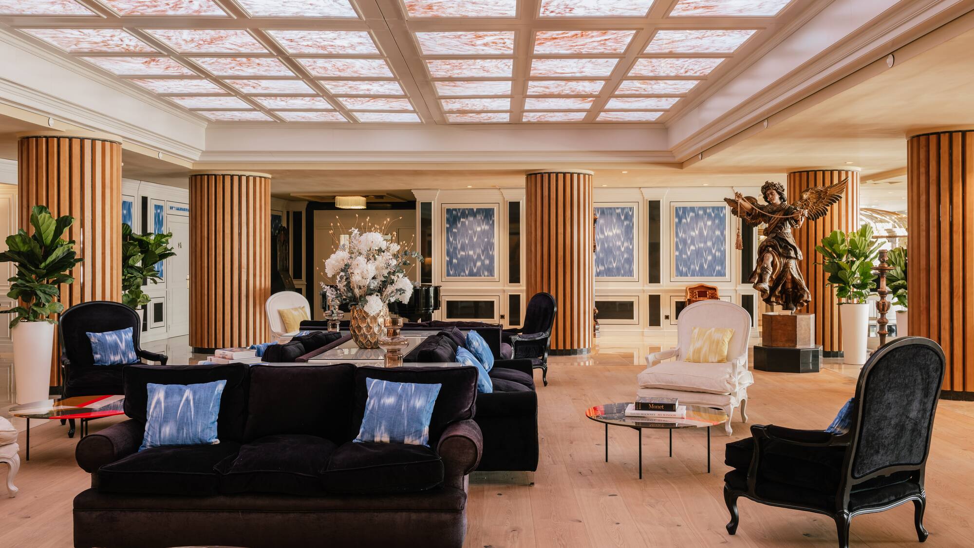 a large room with a large ceiling and a large table and chairs