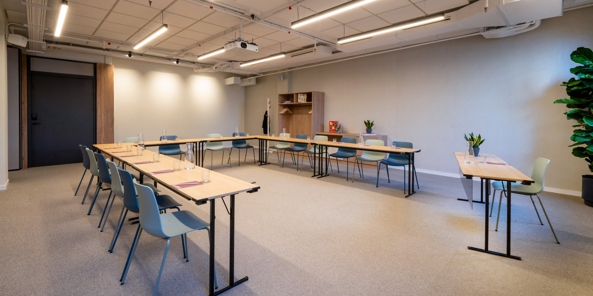 a room with tables and chairs