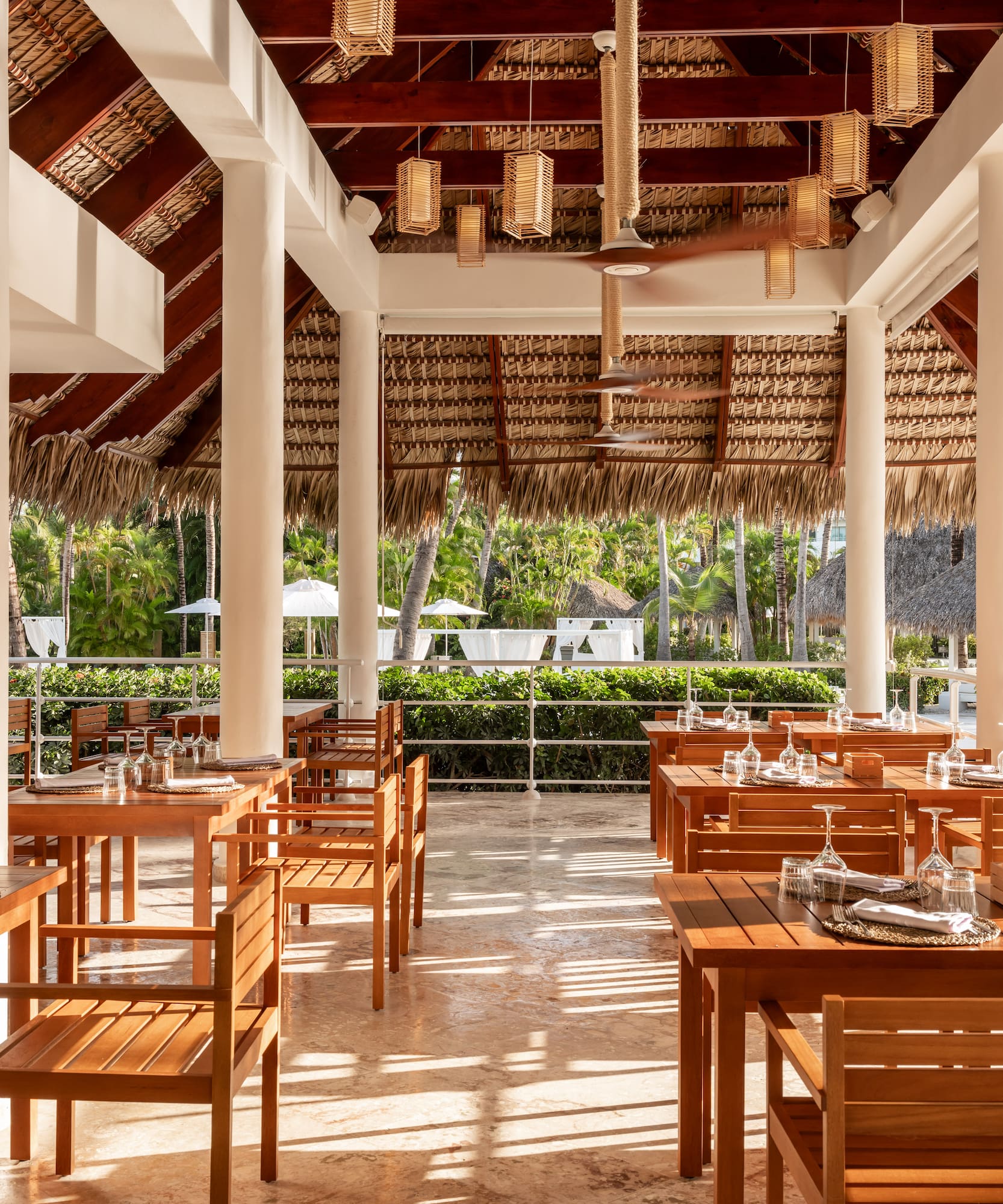 a restaurant with tables and chairs