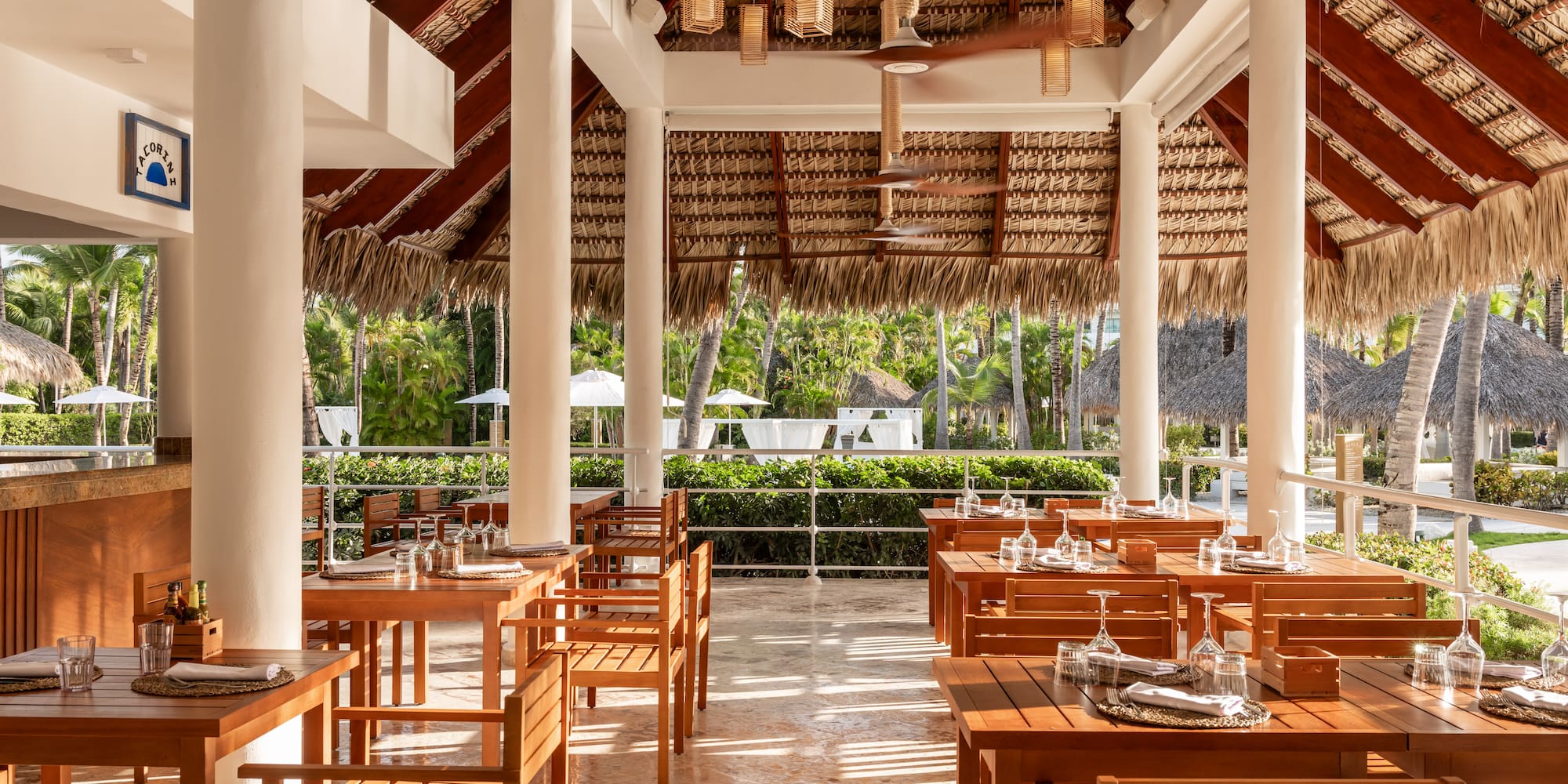 a restaurant with tables and chairs