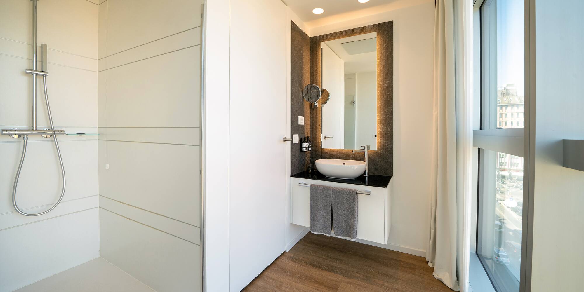 a bathroom with a mirror and a sink