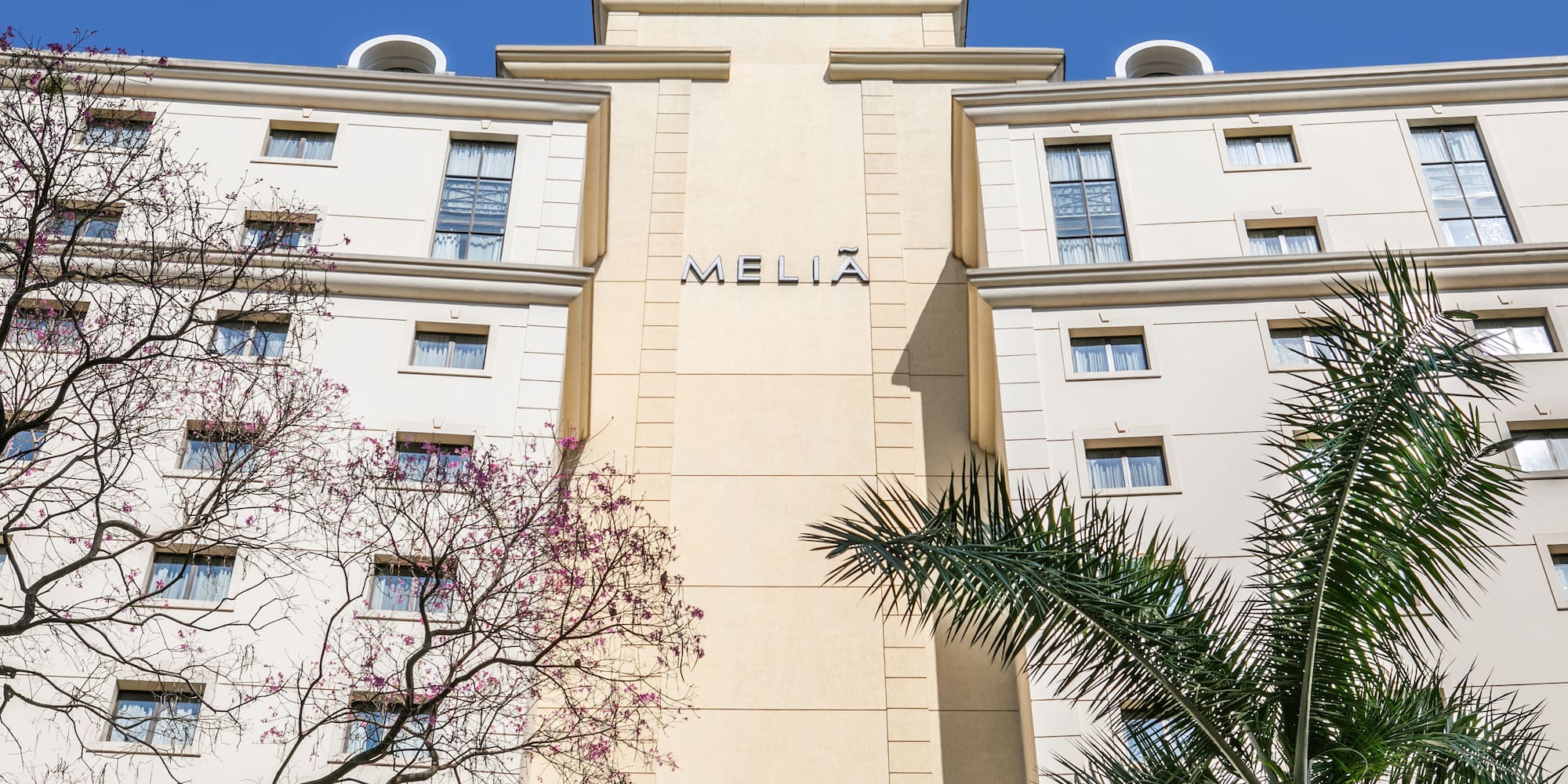 a building with trees in the background