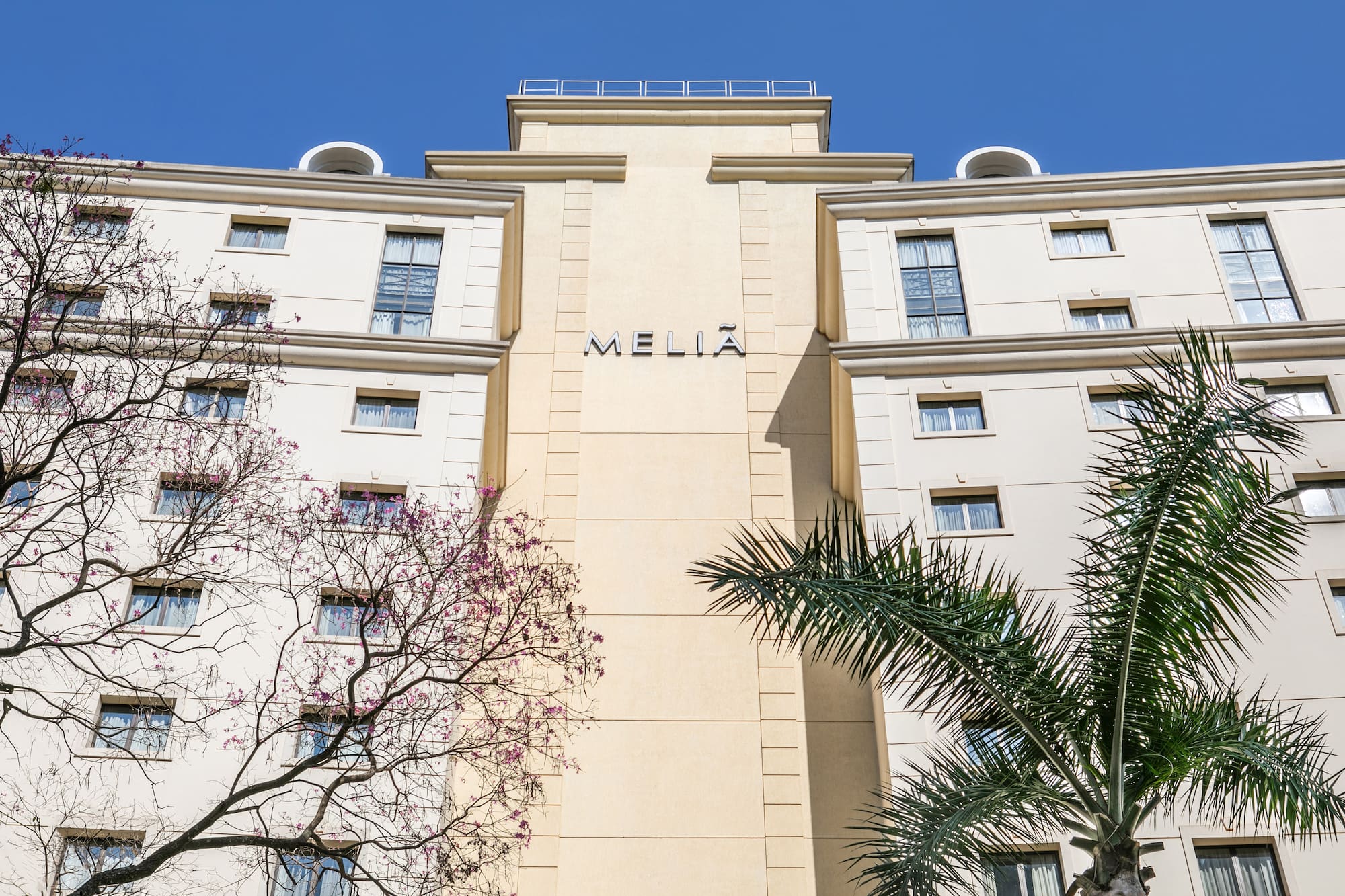 a building with trees in the background