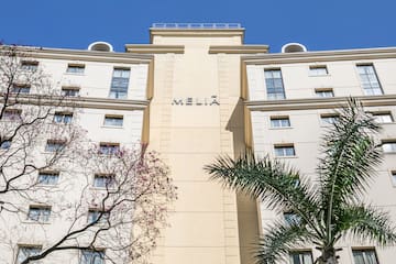 a building with trees in the background