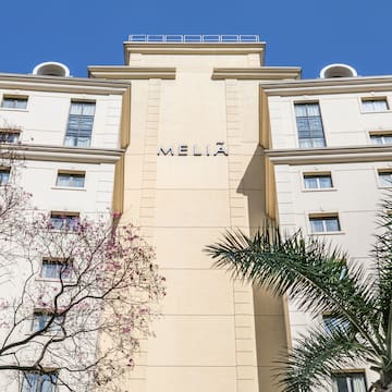 a building with trees in the background
