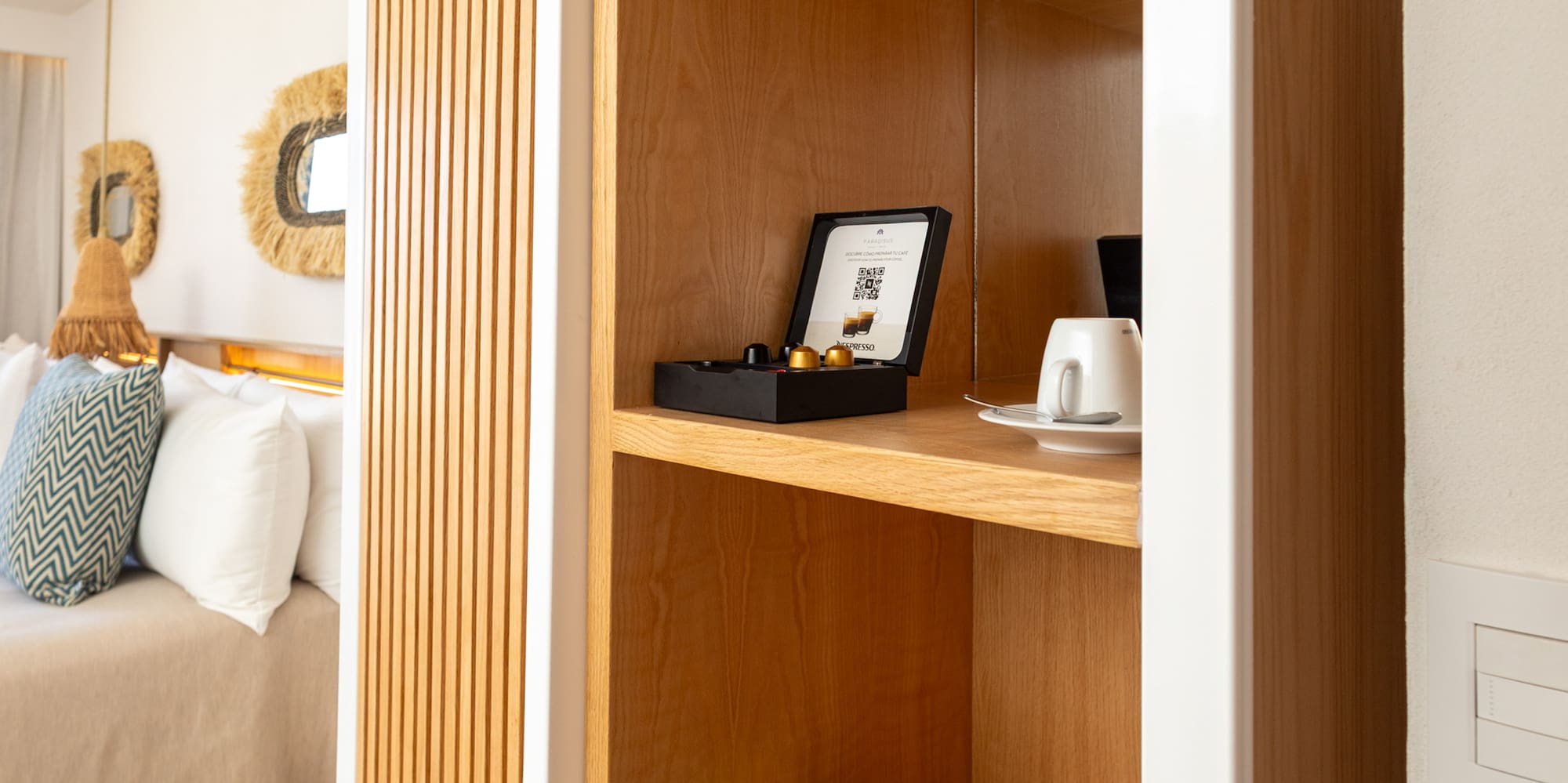 a shelf with snacks and a cup on it