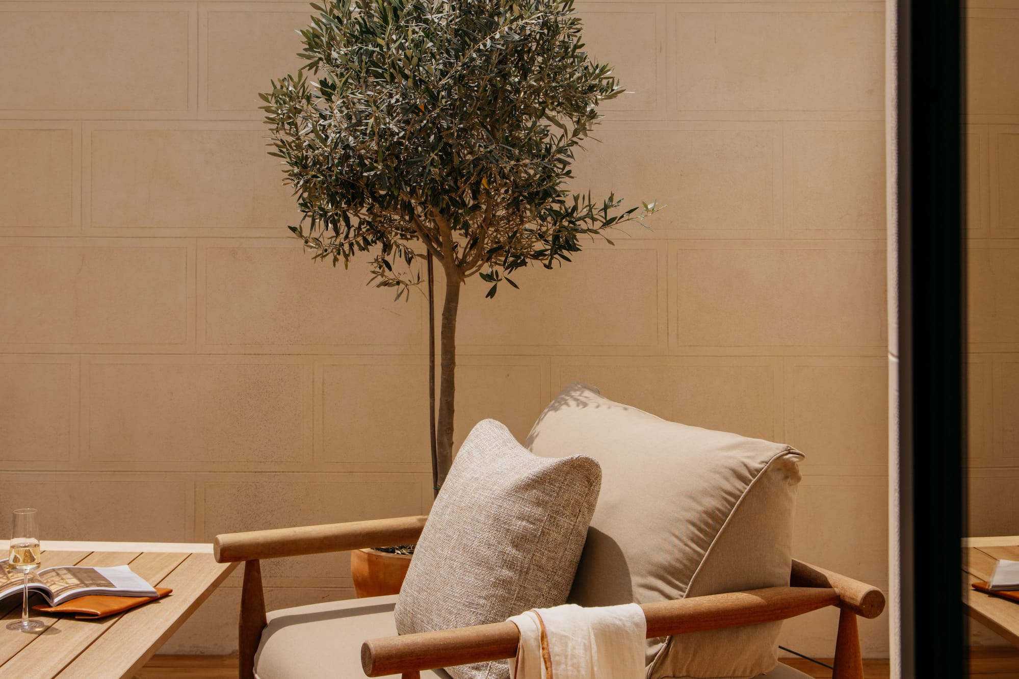 a chair and table on a deck