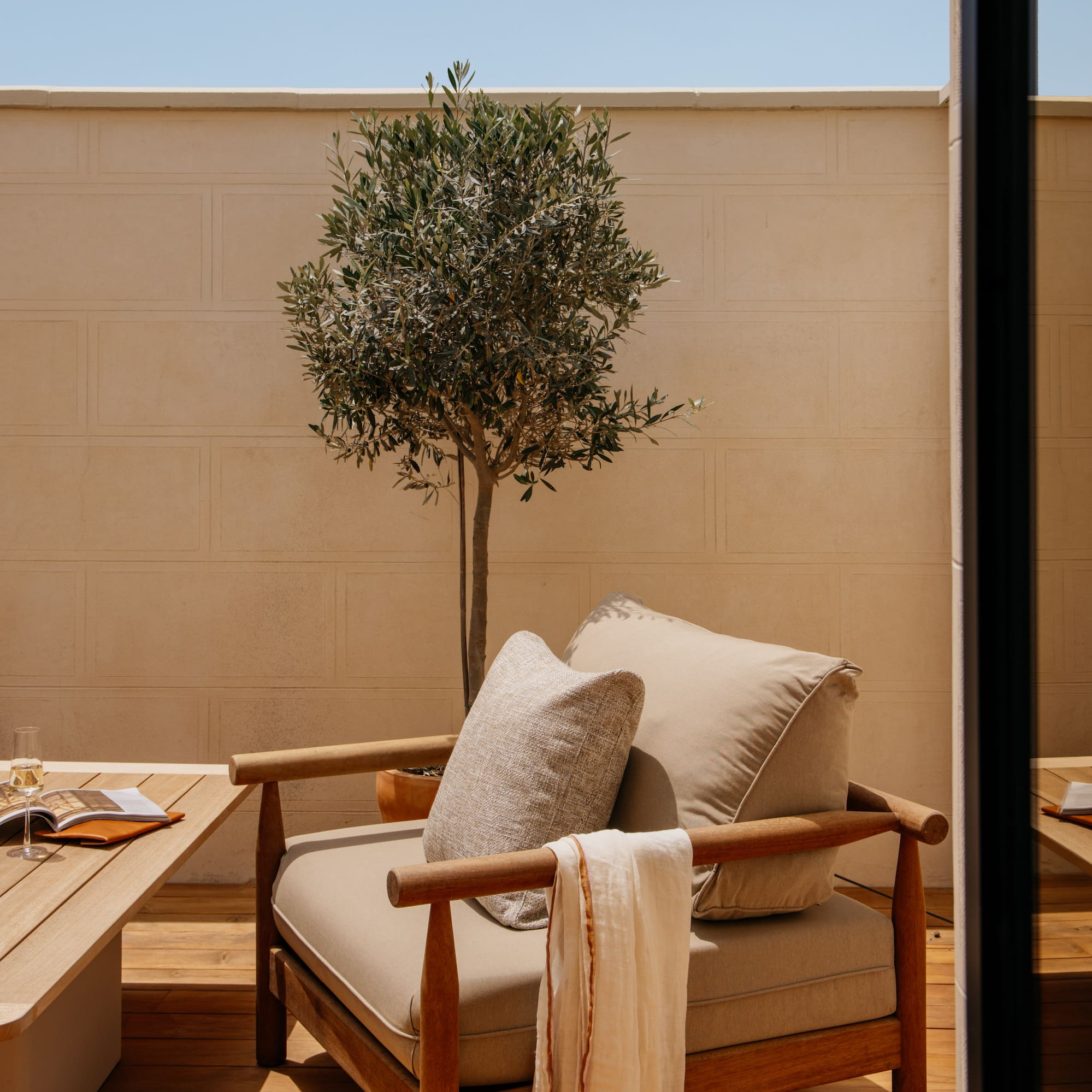 a chair and table on a deck