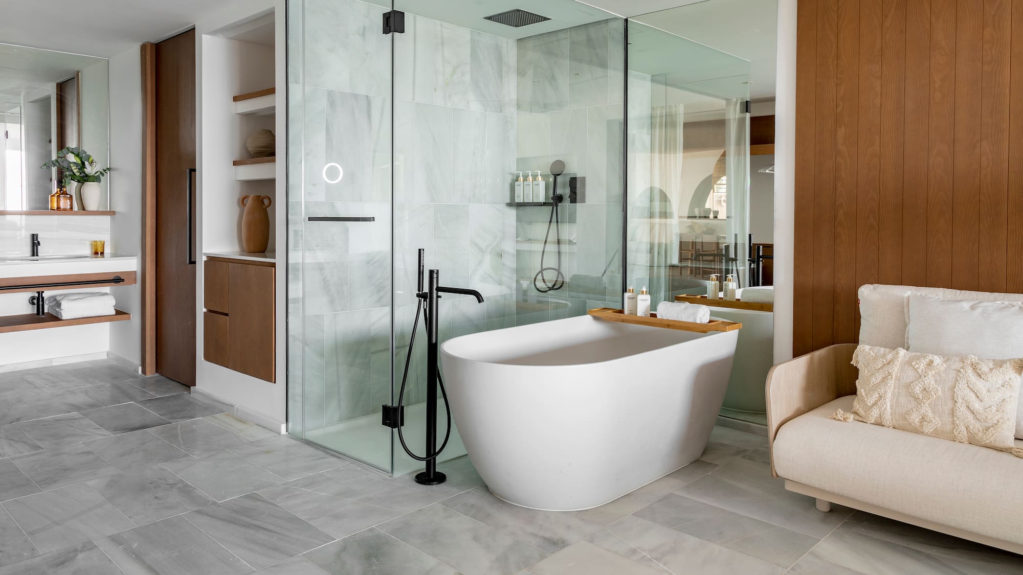 a bathroom with a tub and shower