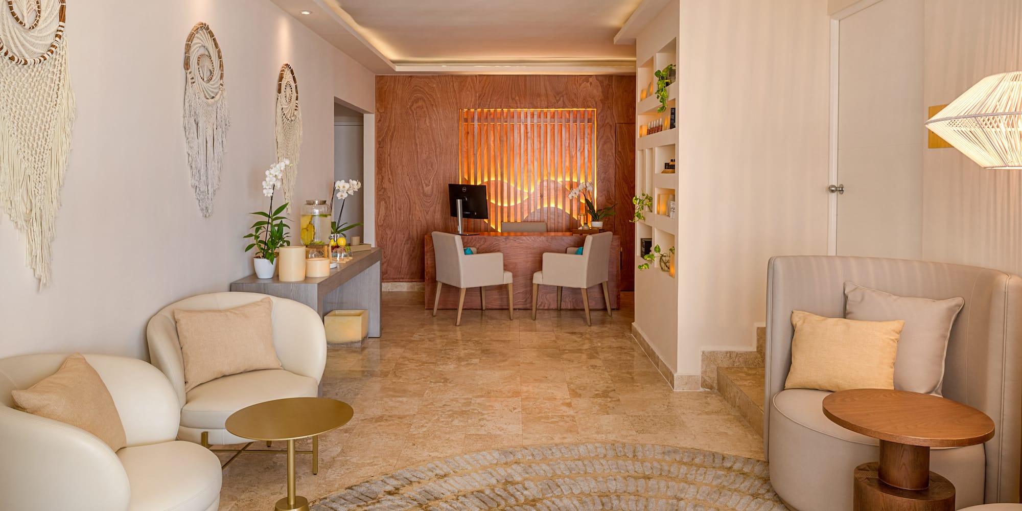 a room with a round rug and chairs