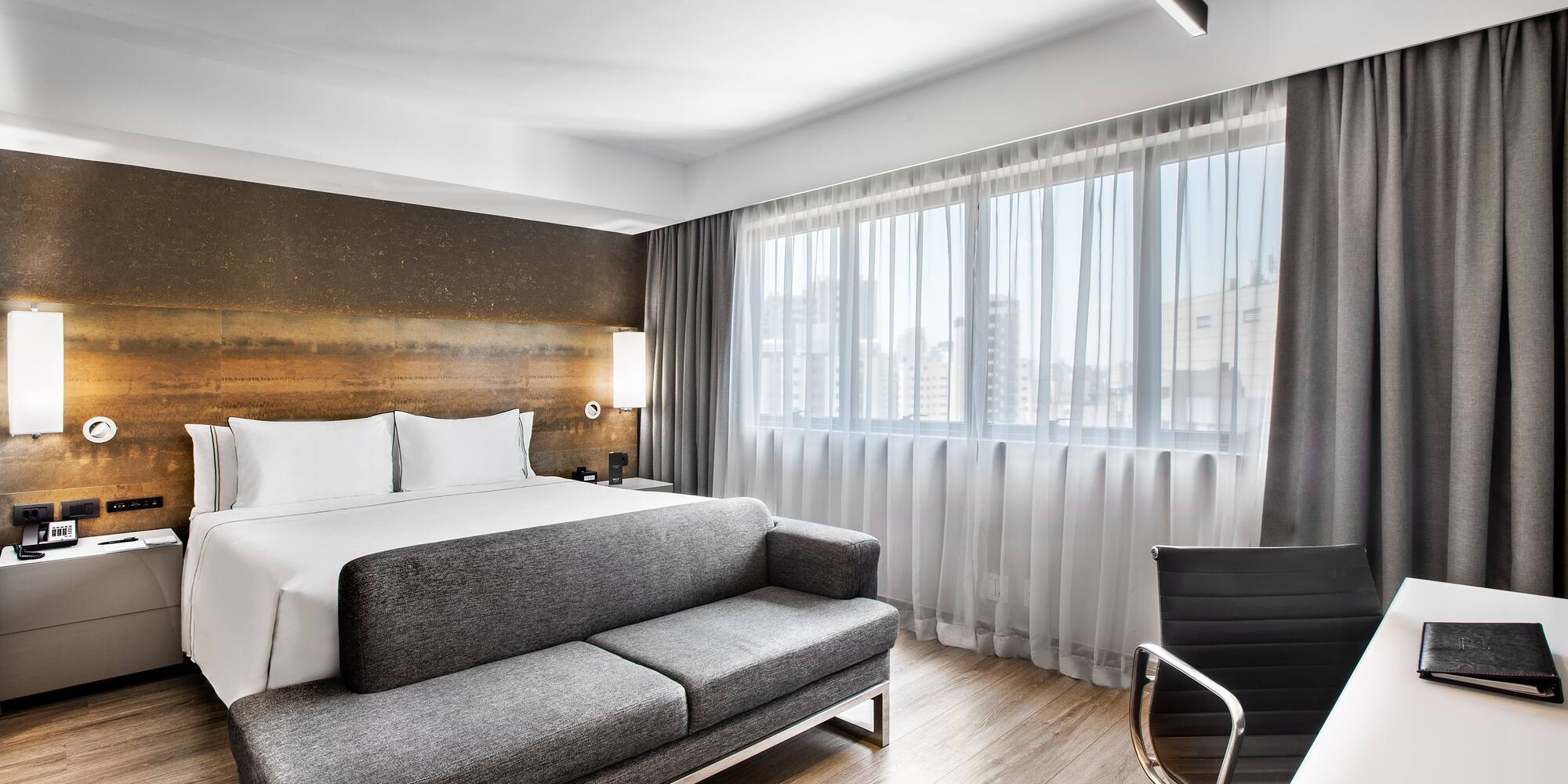 a room with a bed and a couch