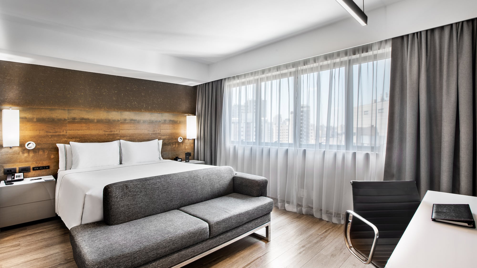 a room with a bed and a couch