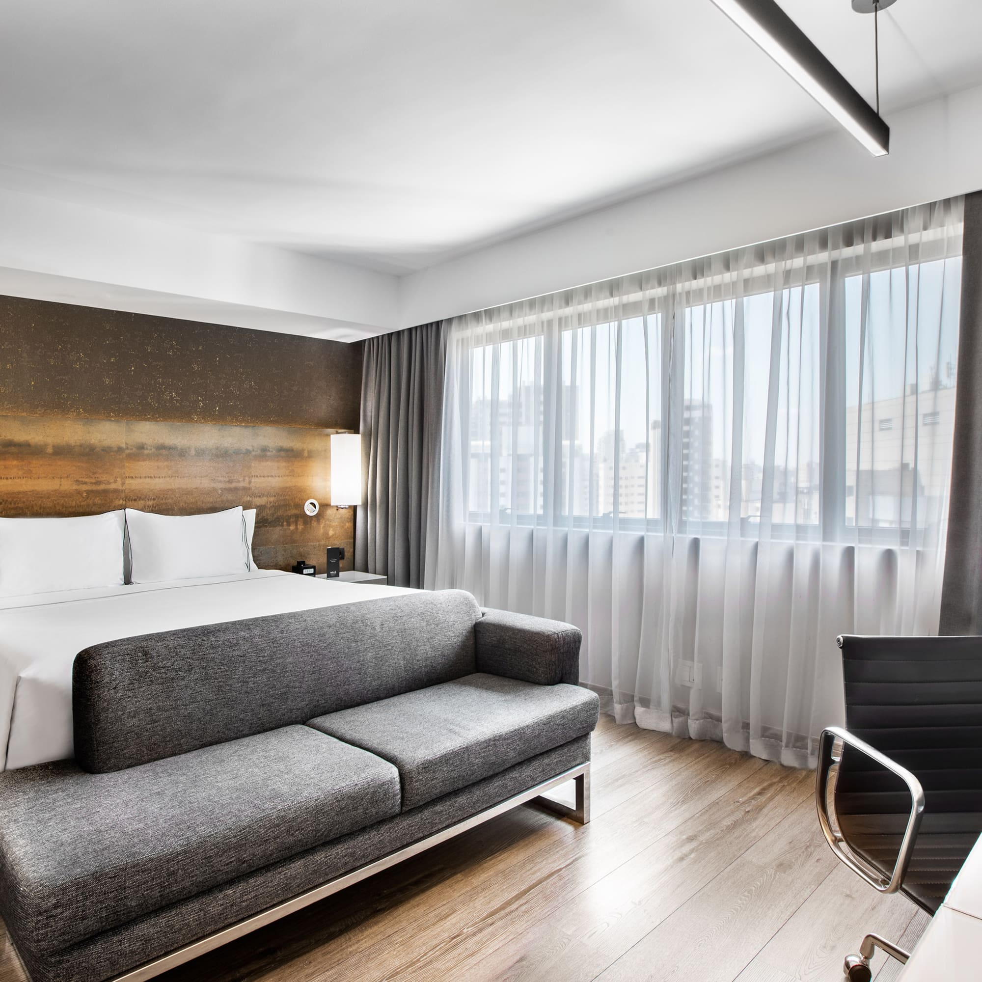 a room with a bed and a couch