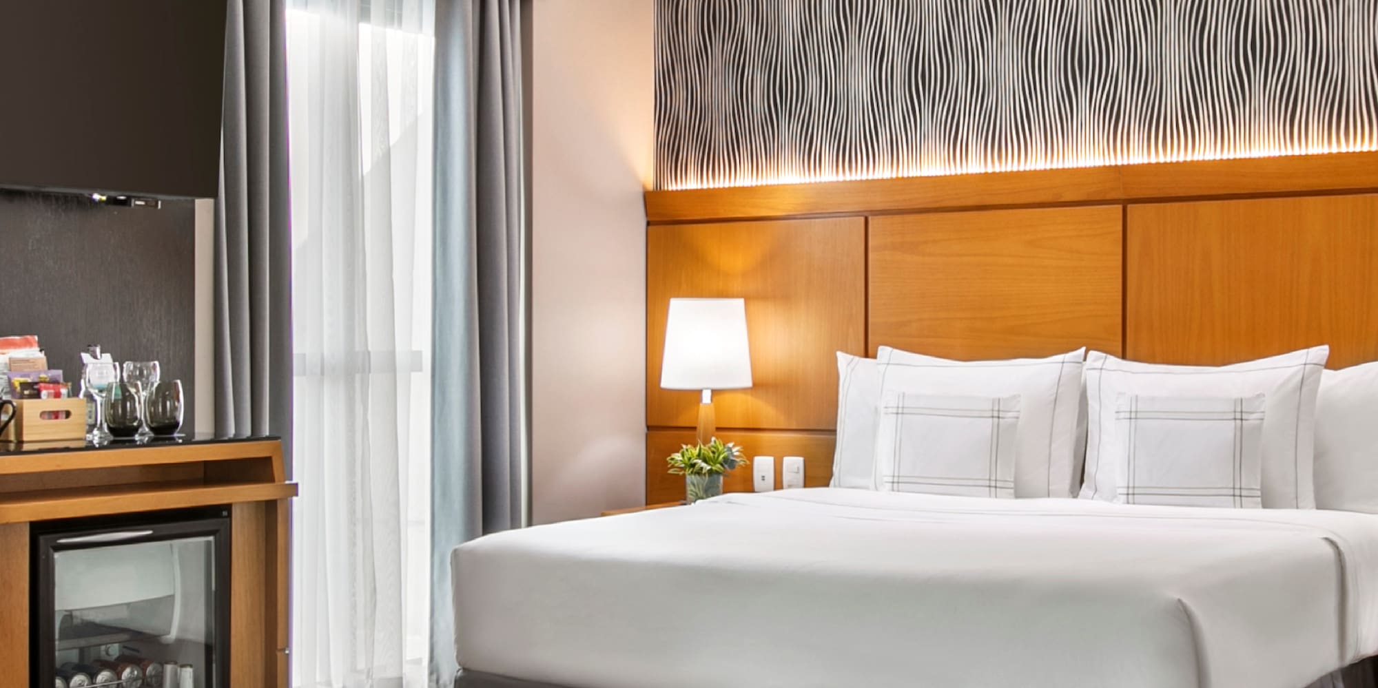 a room with a bed and a cabinet