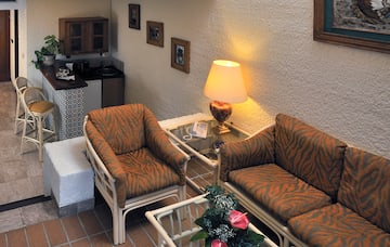 a room with a table and chairs