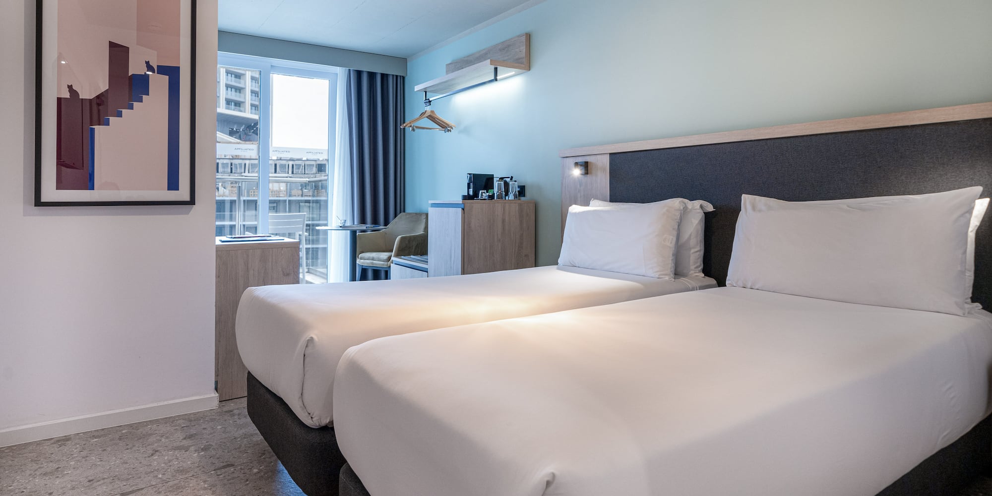 two beds in a hotel room