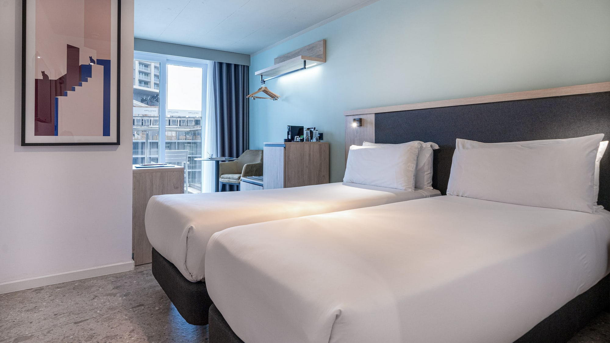 two beds in a hotel room