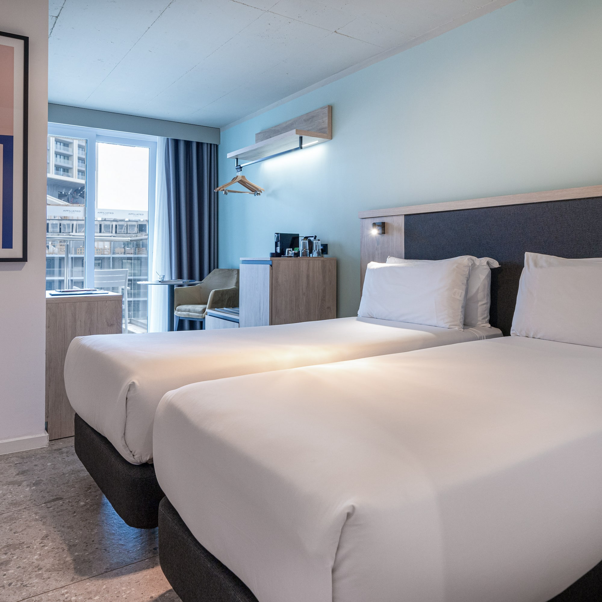 two beds in a hotel room