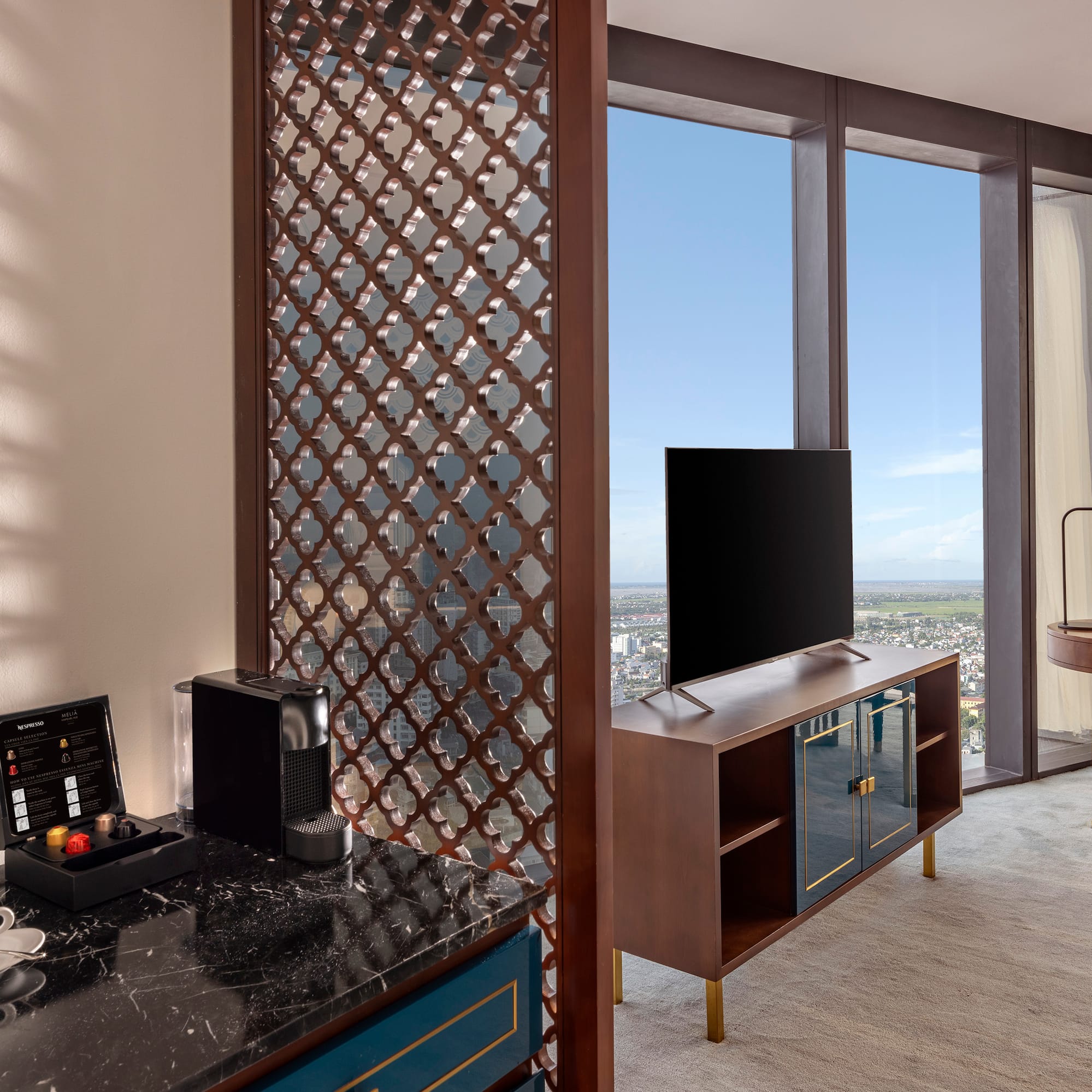 a room with a tv and a table