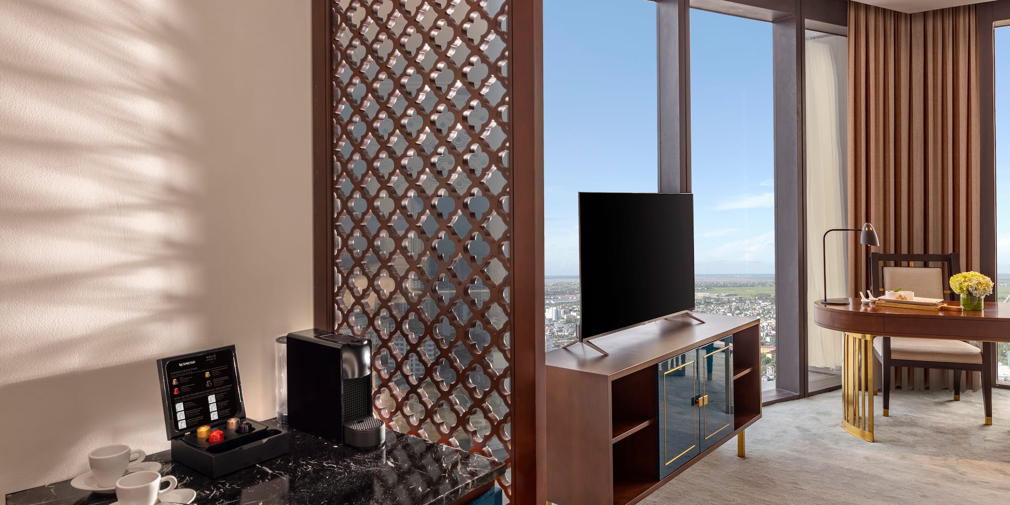 a room with a tv and a table