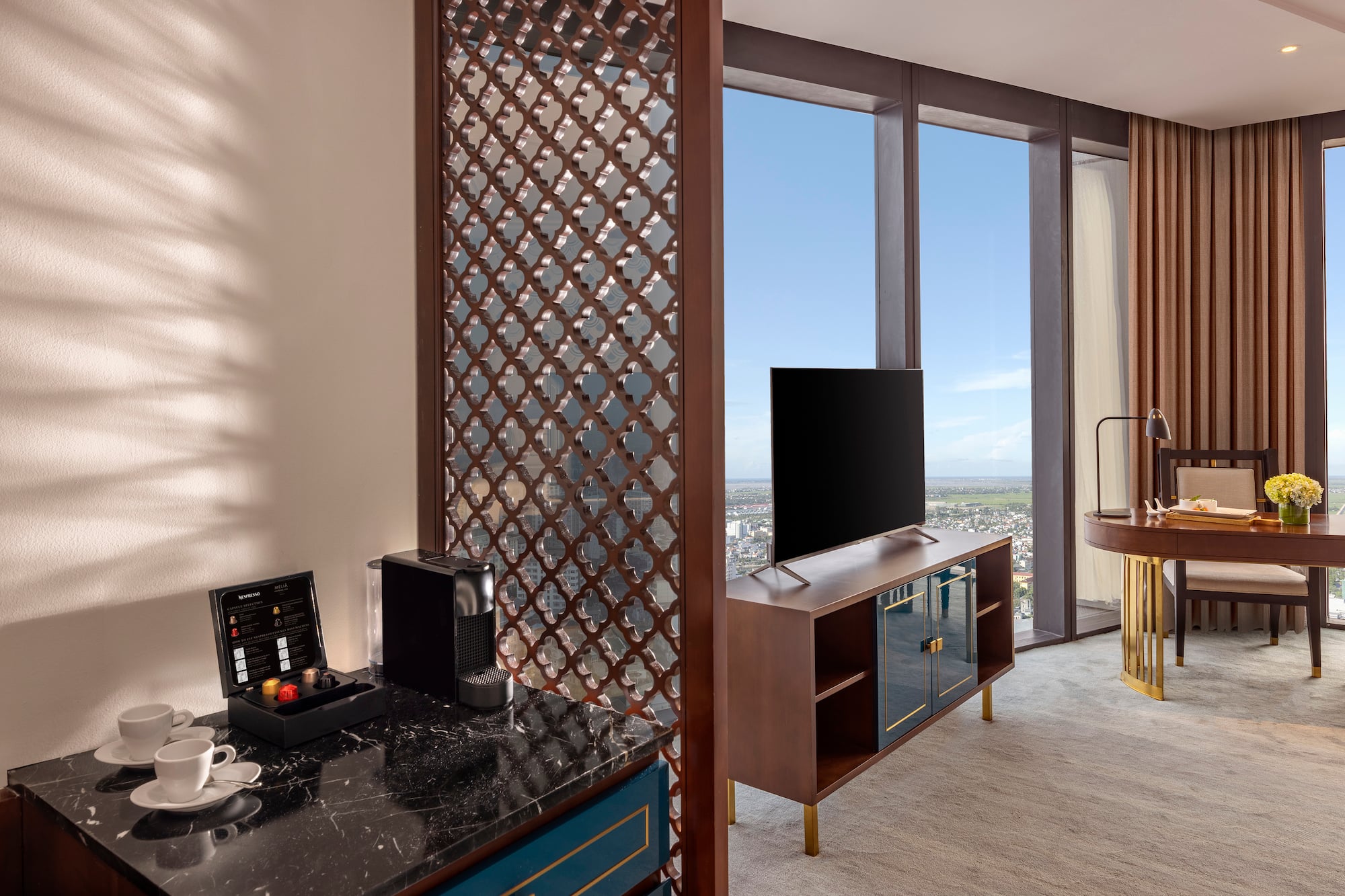 a room with a tv and a table