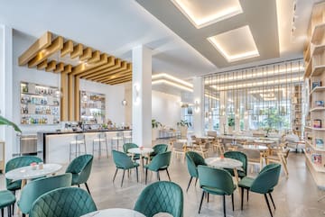 a room with tables and chairs