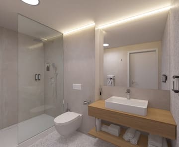 a bathroom with a shower and sink