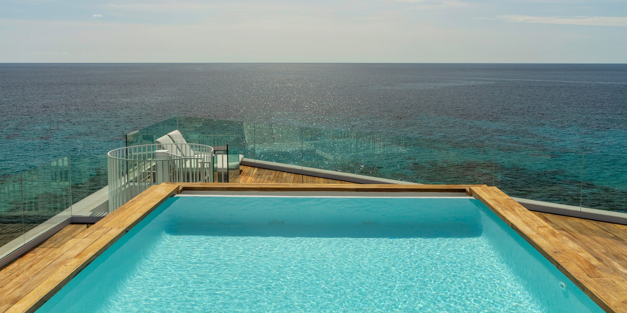 a pool overlooking the ocean