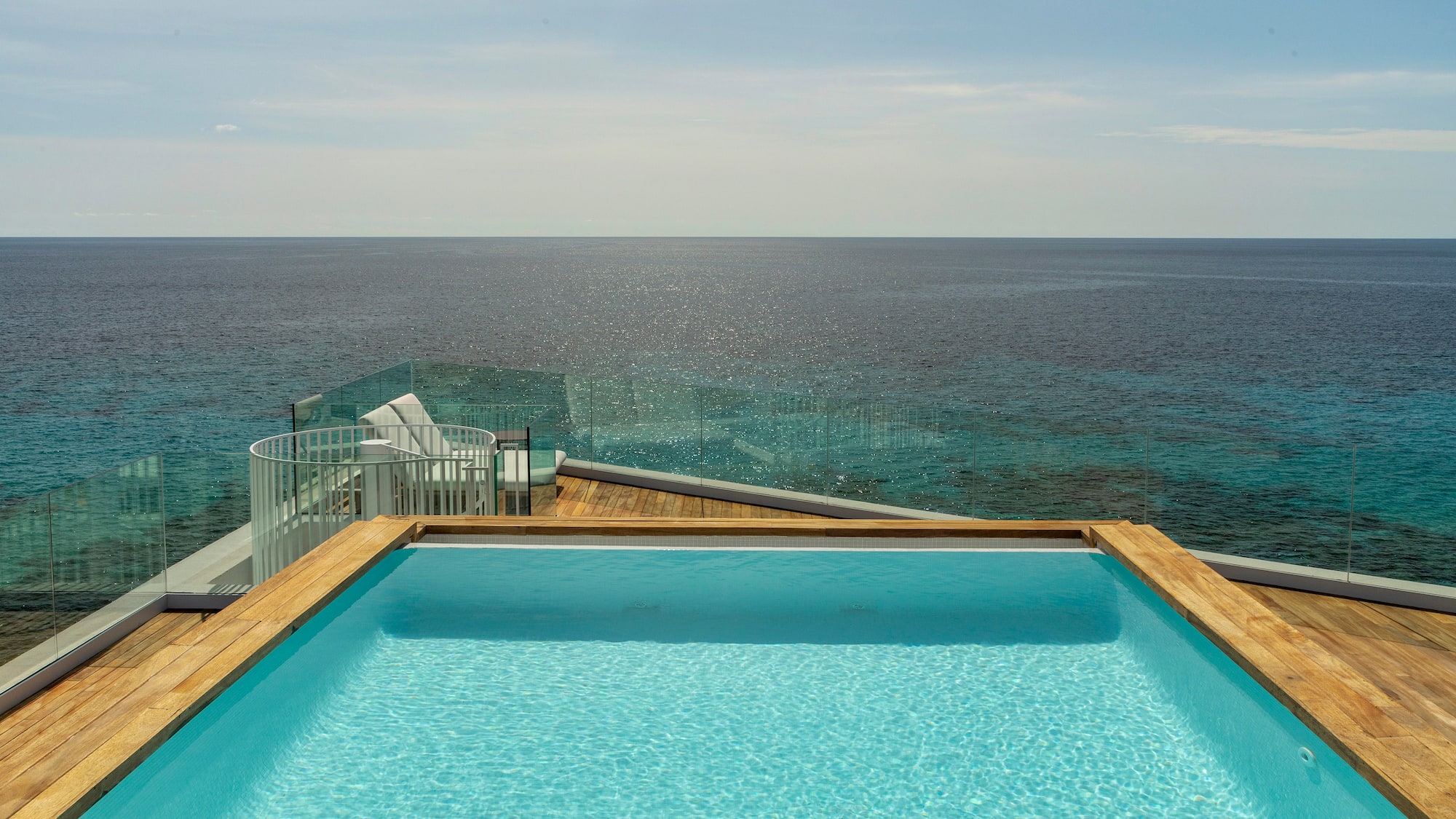 a pool overlooking the ocean
