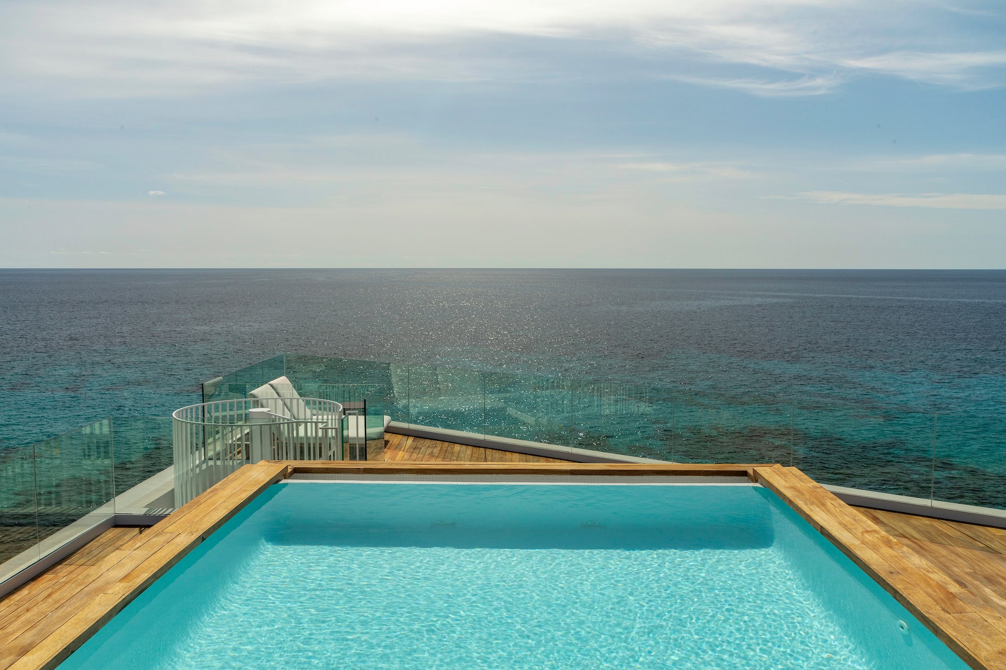 a pool overlooking the ocean