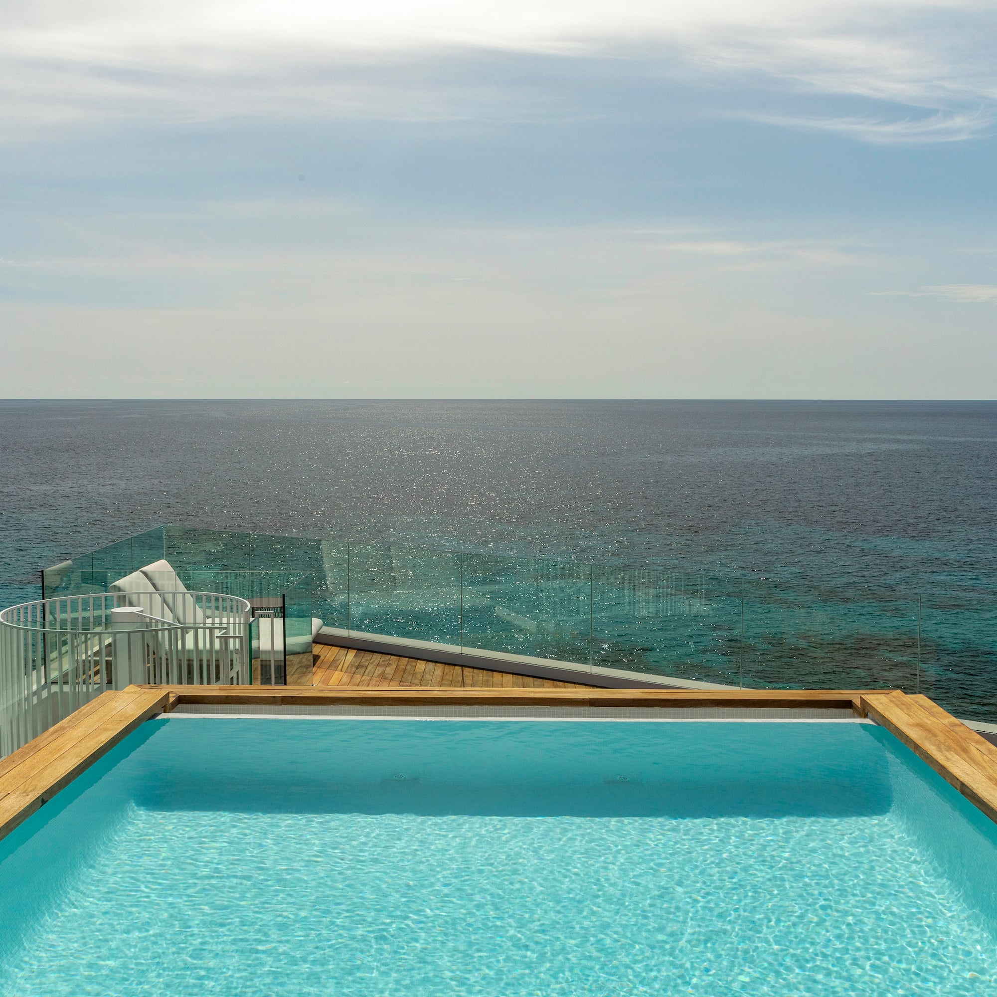 a pool overlooking the ocean
