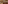 Cozy wooden bar lounge with leather armchairs, stylish bar, and warm lighting.