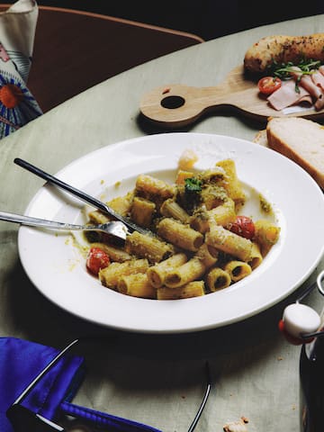 a plate of pasta and fork