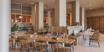 a restaurant with tables and chairs