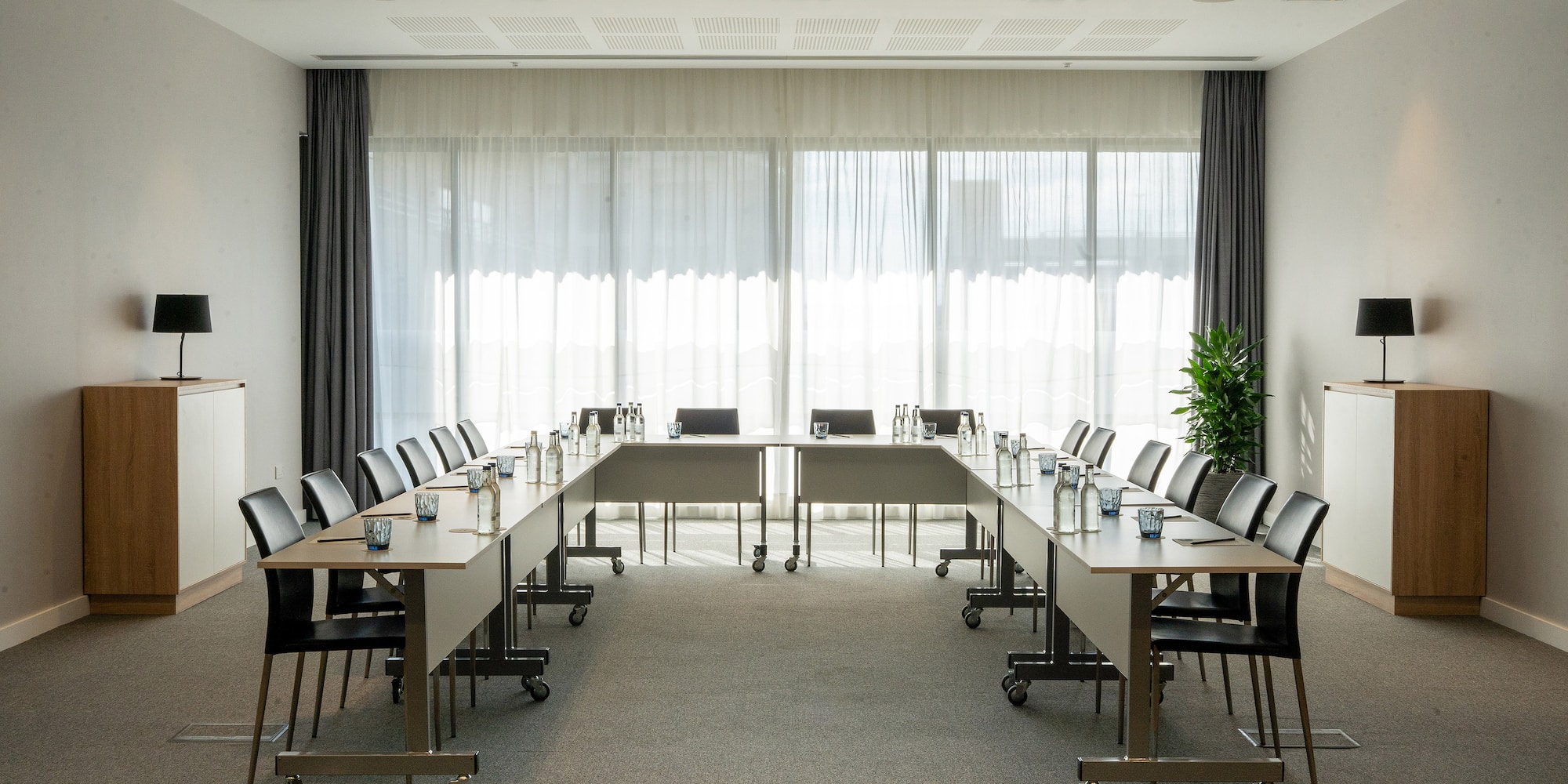 a room with tables and chairs