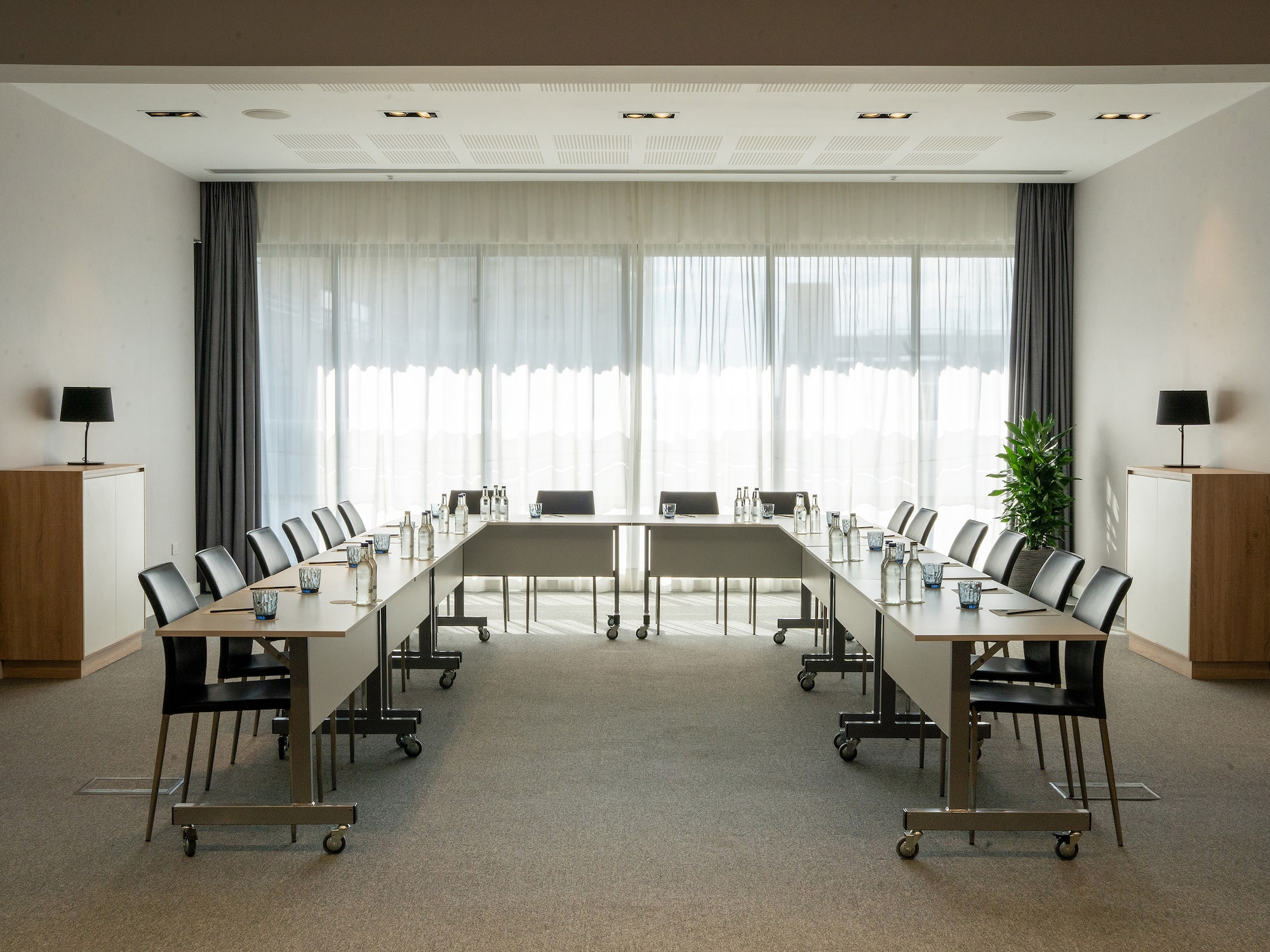 a room with tables and chairs