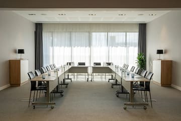 a room with tables and chairs