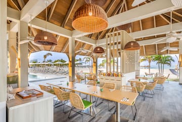 a restaurant with tables and chairs