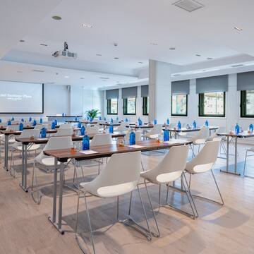 a room with tables and chairs
