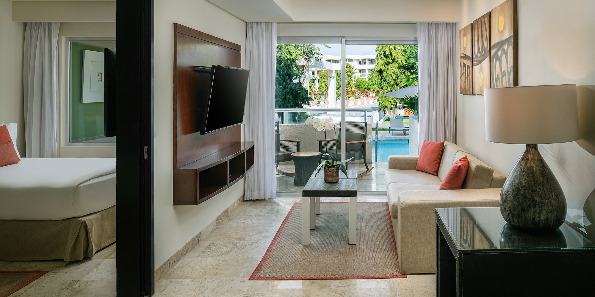a living room with a television and a couch