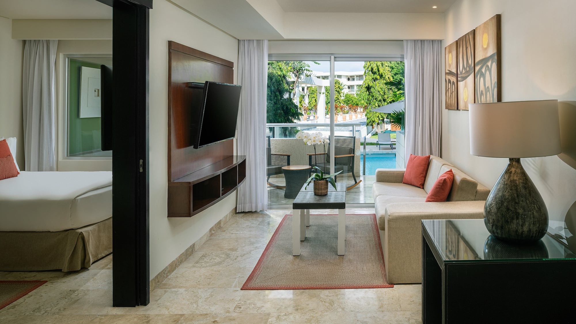 a living room with a television and a couch