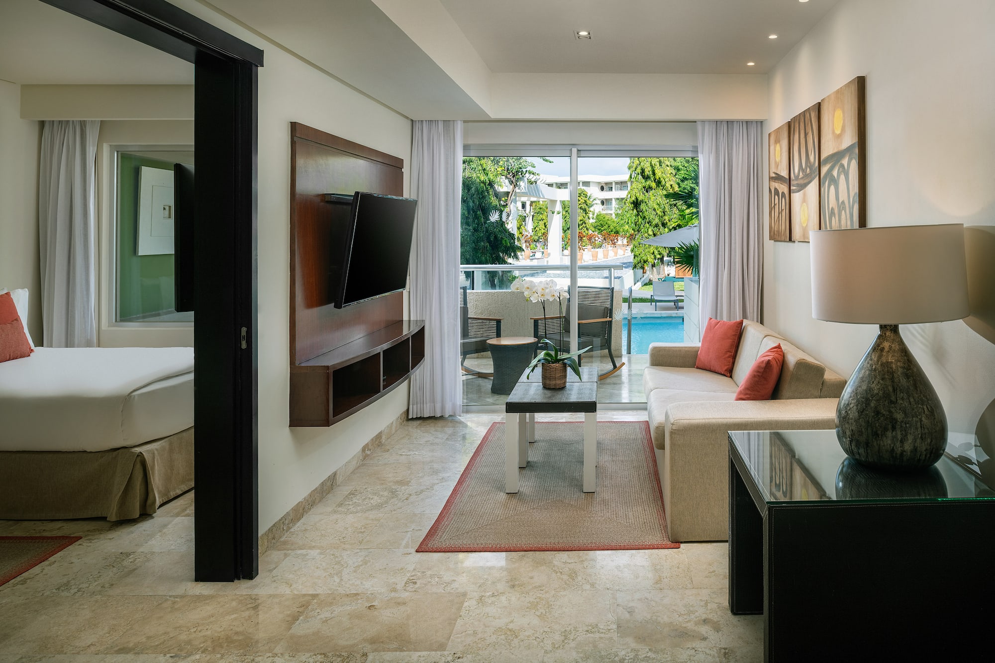 a living room with a television and a couch