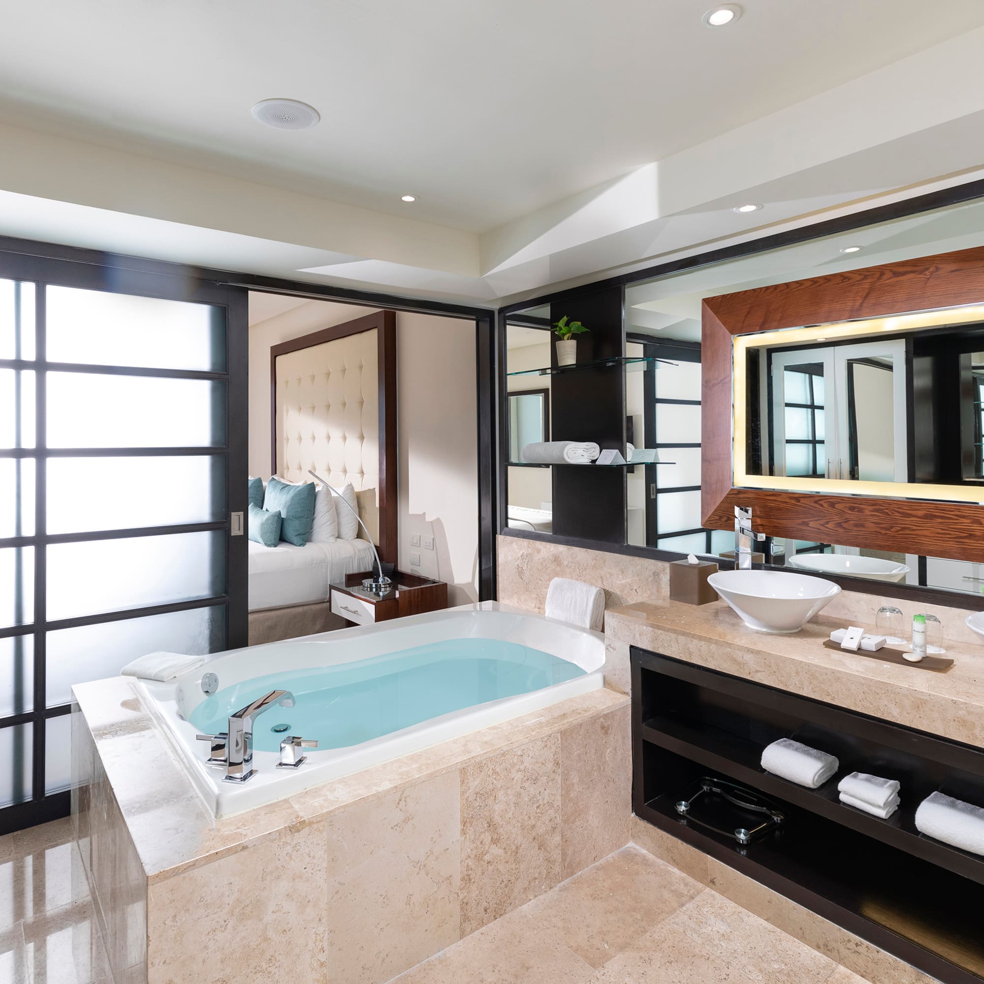 a bathroom with a tub and sink